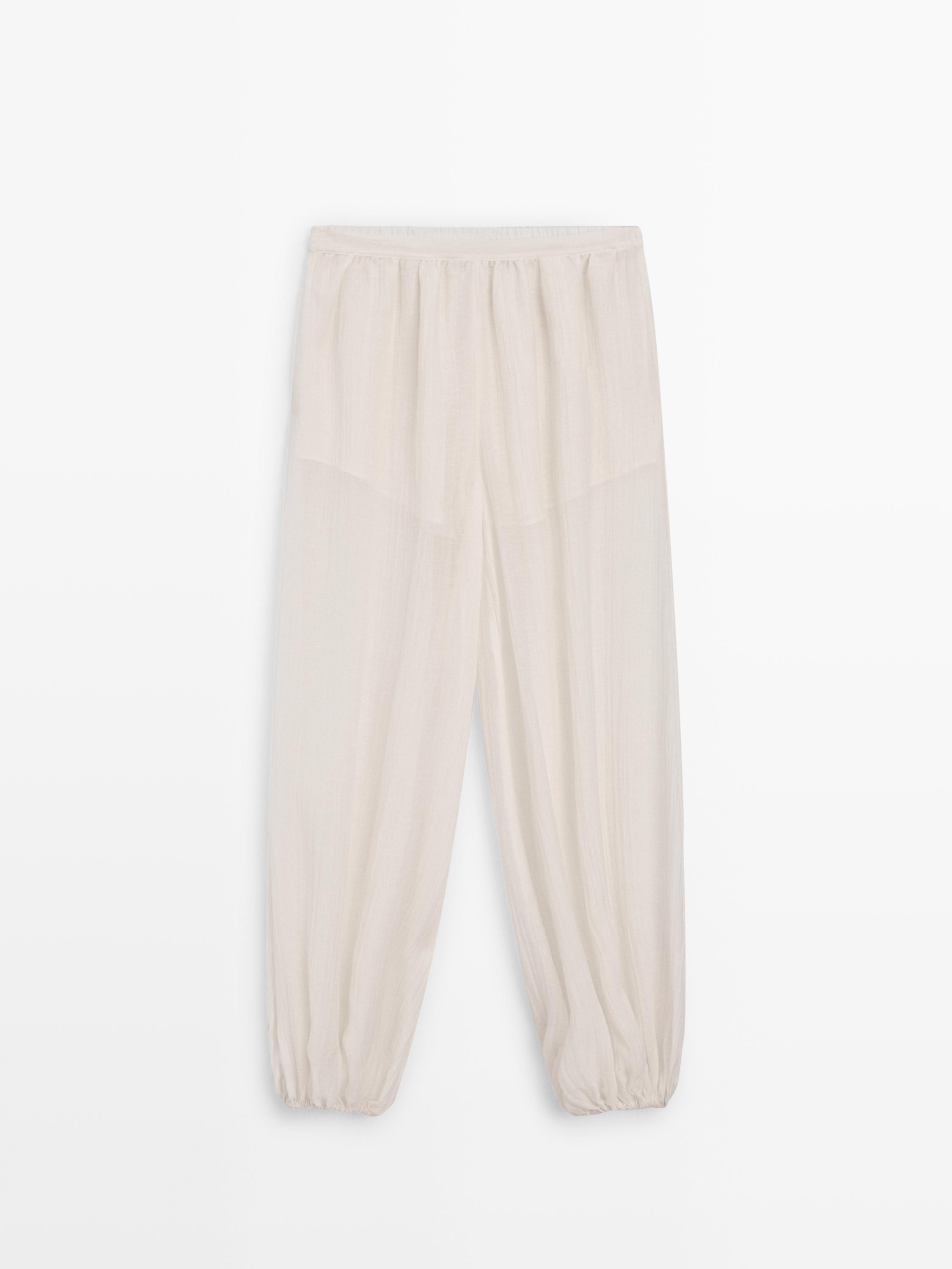 Flowing sarouel trousers with pleated detail